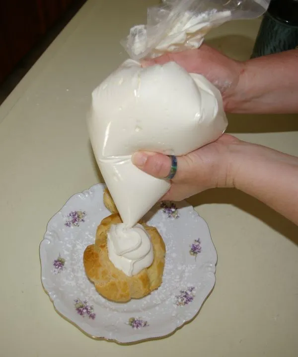 Cut off the tip and squeeze gently with palms